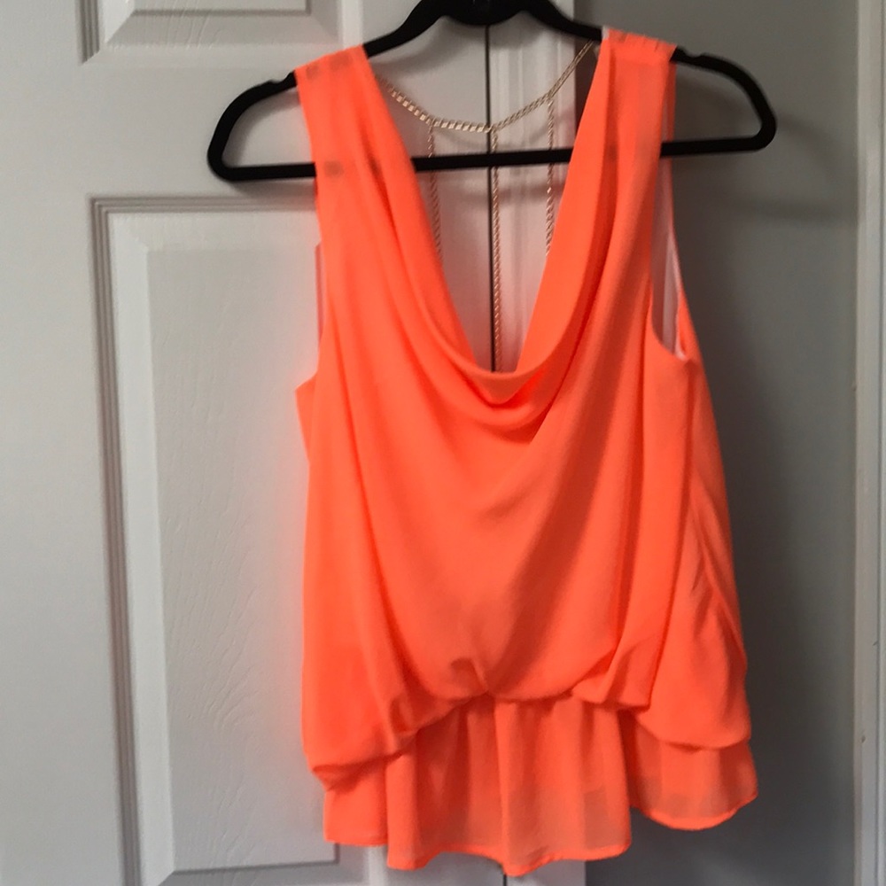 Neon chain backed top. Never worn and has tags!